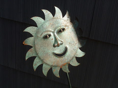 metal sun in a gloomy garden